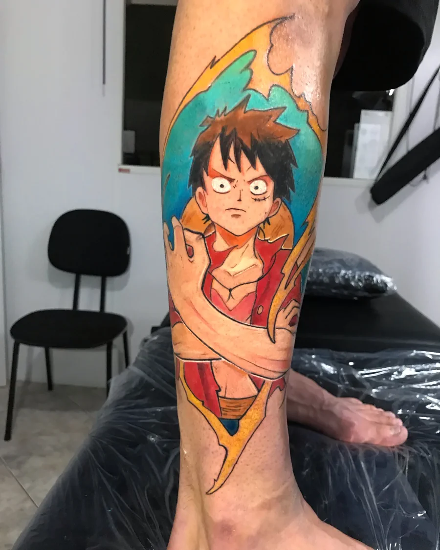 Tatuagem colorida de personagem de anime realizada pela Lopes Tattoo